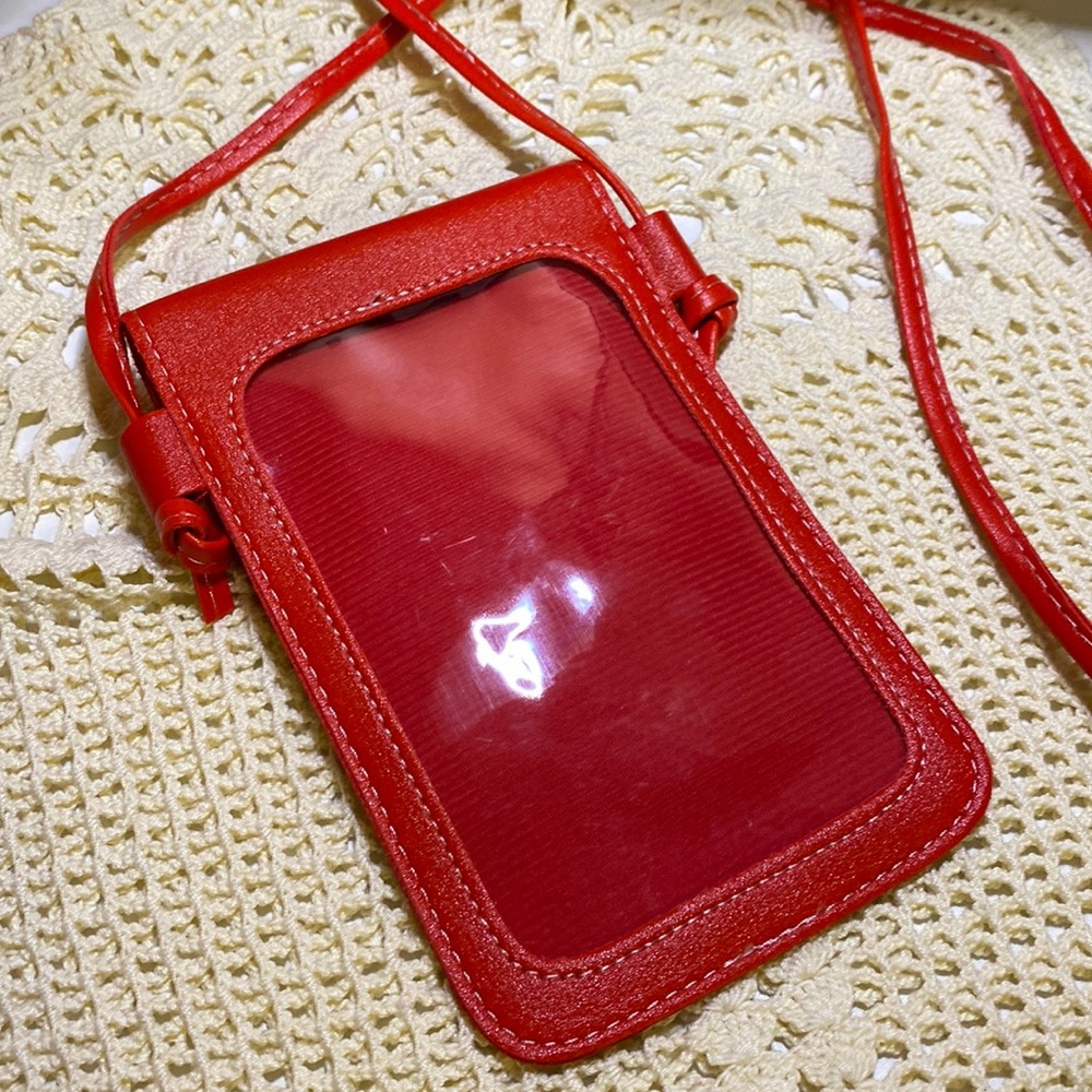 3/$15 Red faux leather crossbody with heart snap and clear back - Picture 6 of 10